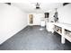 Garage with laundry appliances. Provides utility and ample storage solutions at 3526 Overland Dr, Holiday, FL 34691