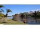 A scenic view of the lake behind this home at 3526 Overland Dr, Holiday, FL 34691