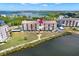 Aerial view of a waterfront condo with a pool at 4620 Bay Blvd # 1154, Port Richey, FL 34668