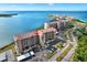 Beautiful waterfront condominium building with lush landscaping, ample parking, and serene ocean views at 4620 Bay Blvd # 1154, Port Richey, FL 34668