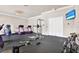 Community gym with exercise equipment, including treadmills, weights, and a weight machine at 4620 Bay Blvd # 1154, Port Richey, FL 34668