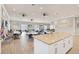 Spacious recreation room with plenty of seating and large island for entertaining residents and guests at 4620 Bay Blvd # 1154, Port Richey, FL 34668