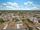 Wide angle aerial view of a neighborhood with mature trees and well-maintained homes at 5155 Baldock Ave, Spring Hill, FL 34608