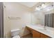 Bright bathroom features a large mirror over the sink and a shower with neutral accents at 5155 Baldock Ave, Spring Hill, FL 34608