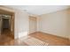 Standard bedroom with hardwood floors, a closet, and natural light at 5155 Baldock Ave, Spring Hill, FL 34608
