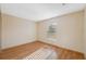 Simple bedroom with laminate flooring and a window providing natural light at 5155 Baldock Ave, Spring Hill, FL 34608