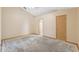 Empty bedroom with peaked ceiling and potential for customization with flooring at 5155 Baldock Ave, Spring Hill, FL 34608
