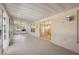 Spacious sunroom offers serene views of the pool and backyard and access to the indoors at 5155 Baldock Ave, Spring Hill, FL 34608