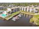 Waterfront condos featuring private boat docks, community pool, and well-manicured landscaping at 5640 Ferguson Ct # 2208, New Port Richey, FL 34652