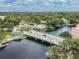 Aerial showing the waterway featuring the turquoise bridge, downtown access and waterfront businesses at 5640 Ferguson Ct # 2208, New Port Richey, FL 34652