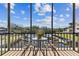 Relaxing enclosed balcony offering seating and serene canal views for peaceful enjoyment at 5640 Ferguson Ct # 2208, New Port Richey, FL 34652