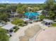 Park and playground area featuring covered playground equipment and splash pad for children at 5640 Ferguson Ct # 2208, New Port Richey, FL 34652