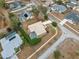 Overhead aerial view of the property, showing the home, pool, and surrounding neighborhood at 6112 Kinlock Ave, Spring Hill, FL 34608