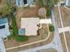 Overhead aerial view of the home, showcasing the screen-enclosed pool and property at 6112 Kinlock Ave, Spring Hill, FL 34608