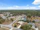 Neighborhood aerial view showcasing the surrounding community and lush greenery at 6112 Kinlock Ave, Spring Hill, FL 34608