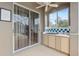 This outdoor kitchen has stainless steel appliances, cabinetry and is the perfect spot for grilling and entertaining at 6112 Kinlock Ave, Spring Hill, FL 34608