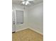 Simple bedroom with tile floor and window coverings at 6401 Drexel Dr # 1, Port Richey, FL 34668