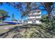 View of the home's boat lift and ample parking at 6801 Nowiki Ave, Hudson, FL 34667