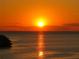 Golden sunset view over the tranquil waters, highlighting the peaceful waterfront lifestyle at 6801 Nowiki Ave, Hudson, FL 34667