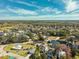 Picturesque aerial shot showcases the peaceful, waterfront real estate neighborhood with houses built on canals and marshland views at 7256 Westwind St, Weeki Wachee, FL 34607