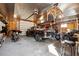 A spacious garage interior with ample room for parking vehicles and storage with shelving at 7256 Westwind St, Weeki Wachee, FL 34607