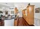 Gourmet kitchen featuring wooden cabinets, stainless appliances, and hardwood floors at 7256 Westwind St, Weeki Wachee, FL 34607