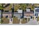 Bird's eye view showcasing the home's roof, driveway, and surrounding neighborhood at 7431 Abington Ave, New Port Richey, FL 34655