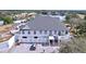 Beautiful clubhouse exterior with lake views and convenient parking spaces at 9065 Mississippi Run, Weeki Wachee, FL 34613