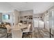 Dining area features a table with seating for four and access to laundry room at 9250 Peony St, New Port Richey, FL 34654