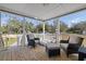 Cozy front porch with comfortable seating, creating a relaxing outdoor space at 9250 Peony St, New Port Richey, FL 34654