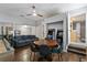 Inviting game room with a shuffleboard table, arcade games and comfortable seating area at 1101 N Betty Ln, Clearwater, FL 33755