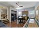 Spacious game room featuring a shuffleboard table, arcade games, and a round dining table at 1101 N Betty Ln, Clearwater, FL 33755