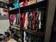 Organized closet with shelves and hanging rods at 11134 Horned Owl Rd, Weeki Wachee, FL 34614