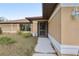 Close up view of the exterior showing the siding and front garden at 1358 Newhope Rd, Spring Hill, FL 34606