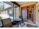 Charming front porch area with seating, perfect for relaxing outdoors at 1358 Newhope Rd, Spring Hill, FL 34606