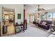 Open-concept living room with views to the dining area and backyard at 1358 Newhope Rd, Spring Hill, FL 34606