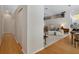 Bright hallway leading to a living room with neutral paint colors at 16411 County Road 675, Parrish, FL 34219