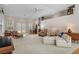 Bright and spacious living room with access to the outdoors and a decorative rug at 16411 County Road 675, Parrish, FL 34219