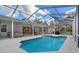 Relaxing screened pool with backyard views and attached patio for lounging and entertainment at 16411 County Road 675, Parrish, FL 34219