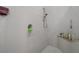 Clean, tiled shower with a built-in bench and a modern showerhead fixture at 16411 County Road 675, Parrish, FL 34219