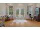 Cozy seating area with a view of the outdoors and a decorative rug at 16411 County Road 675, Parrish, FL 34219