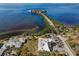 Stunning aerial view of a waterfront building with coastal access and beautiful surroundings at 1723 Gulf Rd # 104, Tarpon Springs, FL 34689