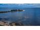 Scenic aerial view showcasing the island community with beautiful waterfront views and surrounding natural beauty at 1723 Gulf Rd # 104, Tarpon Springs, FL 34689