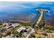 Aerial view of waterfront homes, serene bay, and bridge with gorgeous community views at 1723 Gulf Rd # 104, Tarpon Springs, FL 34689