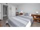 Comfortable bedroom with a neutral palette, creating a serene and inviting space at 1723 Gulf Rd # 104, Tarpon Springs, FL 34689