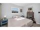 Bright bedroom with a neutral palette and ample sunlight, creating a peaceful retreat at 1723 Gulf Rd # 104, Tarpon Springs, FL 34689