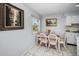 Dining area featuring tile floors and seating for four at 1723 Gulf Rd # 104, Tarpon Springs, FL 34689