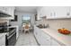 View of the kitchen and dining area at 1723 Gulf Rd # 104, Tarpon Springs, FL 34689