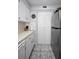 Kitchen featuring stainless steel appliances and ample cabinet space at 1723 Gulf Rd # 104, Tarpon Springs, FL 34689