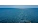 A serene ocean view featuring a calm and vast expanse of water at 1723 Gulf Rd # 104, Tarpon Springs, FL 34689